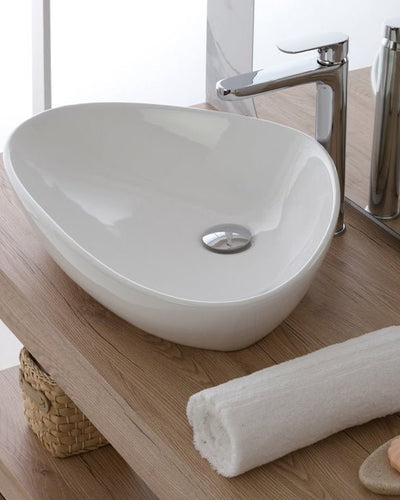 Lavabo consolle in ceramica sagomato Piramid